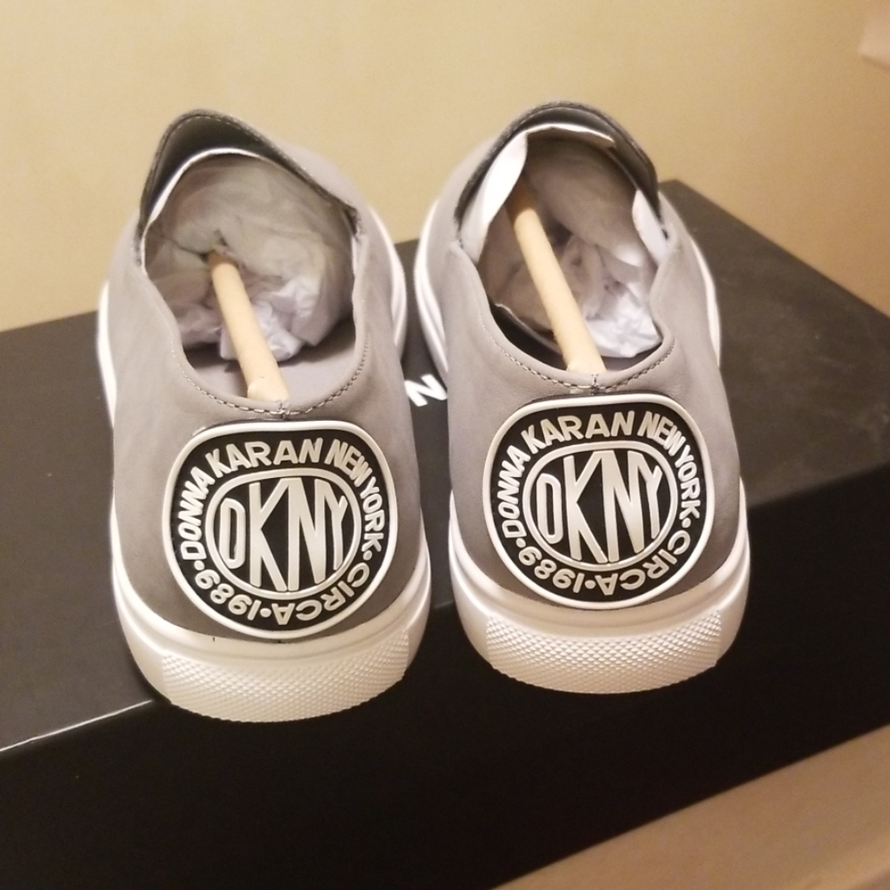 Gray & white DKNY slip on sneaker